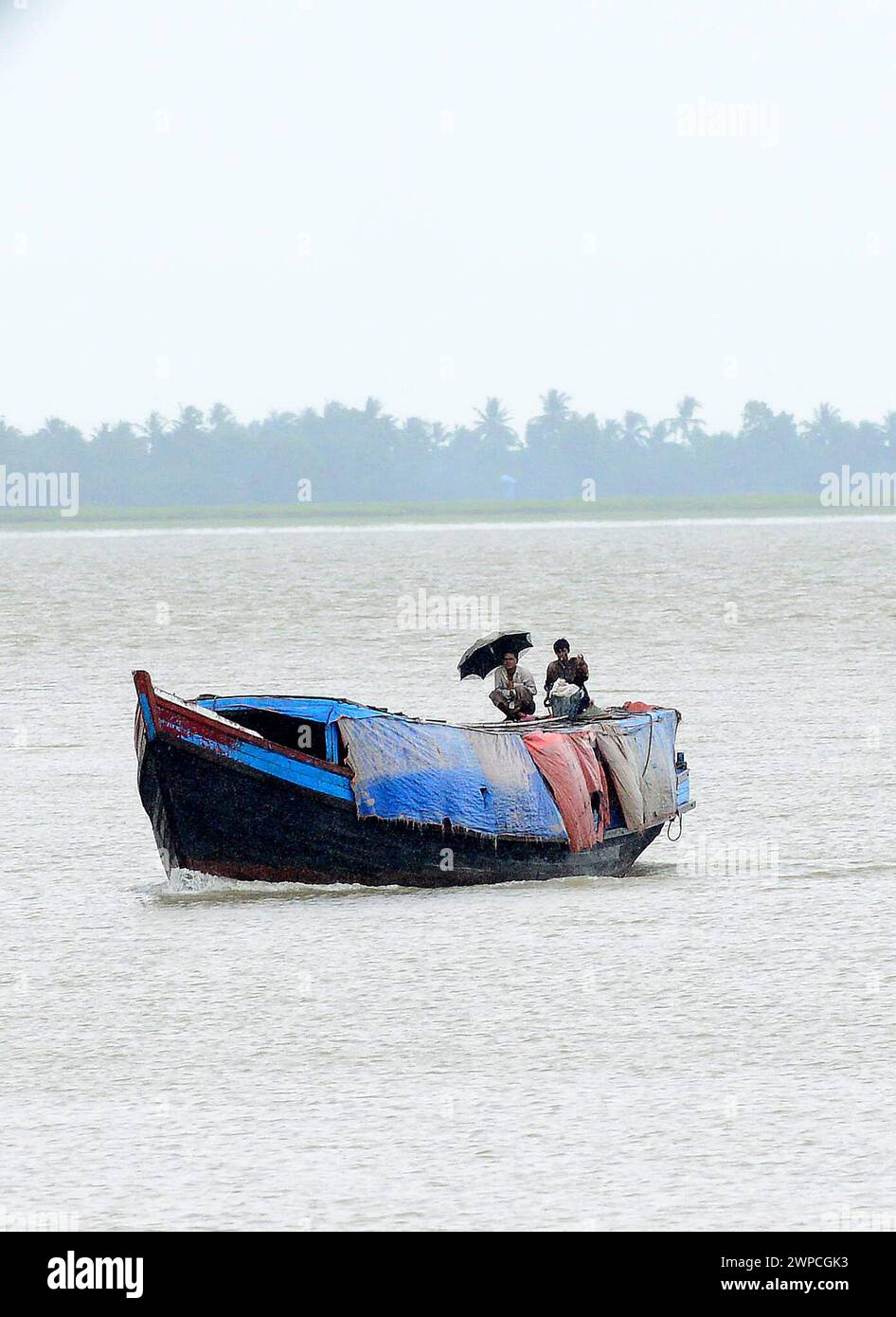 Fortes pluies de mousson le long de la rivière Kaladan dans l'État de Rakhine dans l'ouest du Myanmar. Banque D'Images