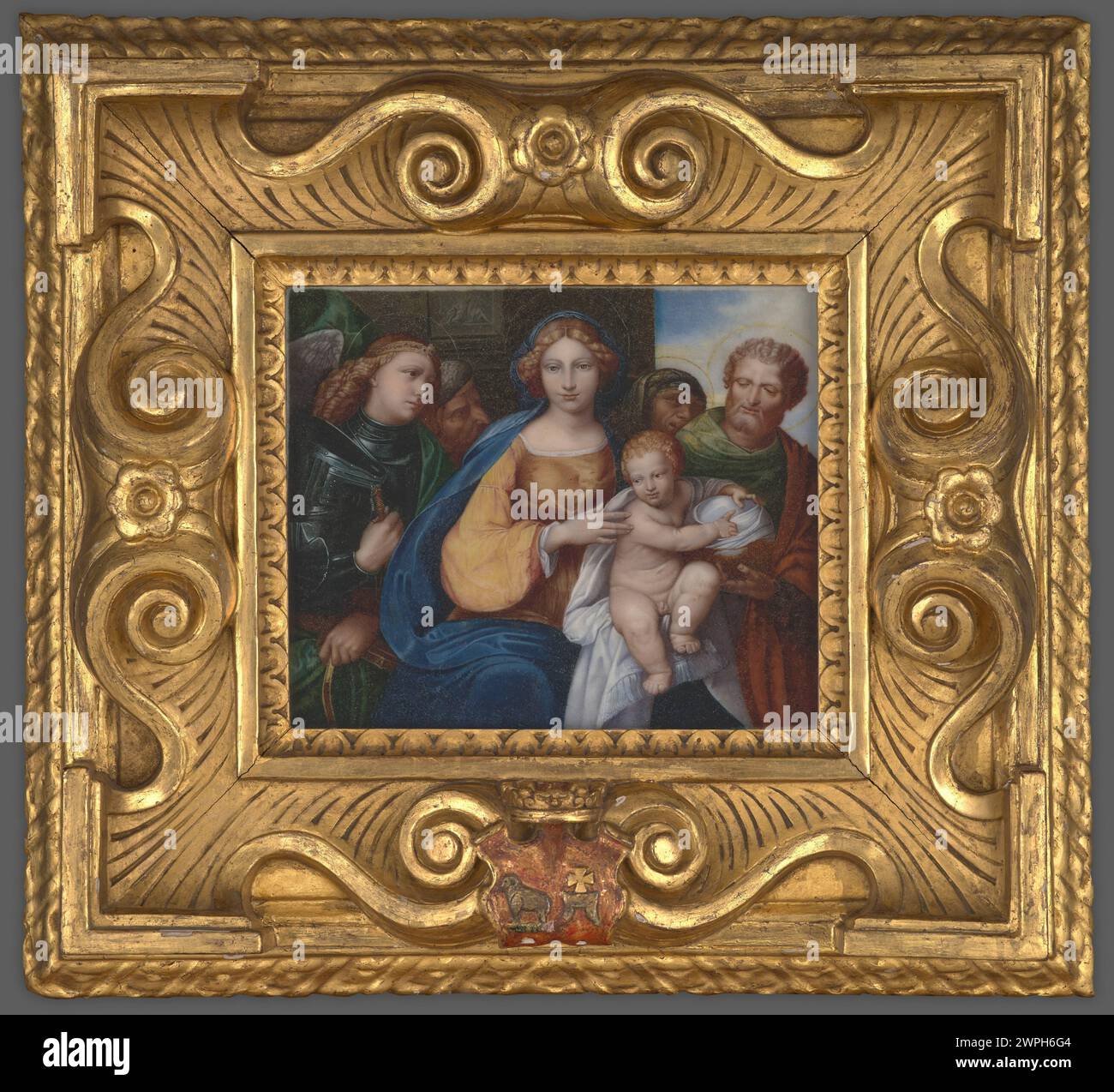 Peinture de Benvenuto Tisi après 1524 représente notre-Dame des enfants avec l'Archange Michel et Saint Joseph, montrant des figures religieuses, iconographie et composition dévotionnelle du début du XVIe siècle. Banque D'Images