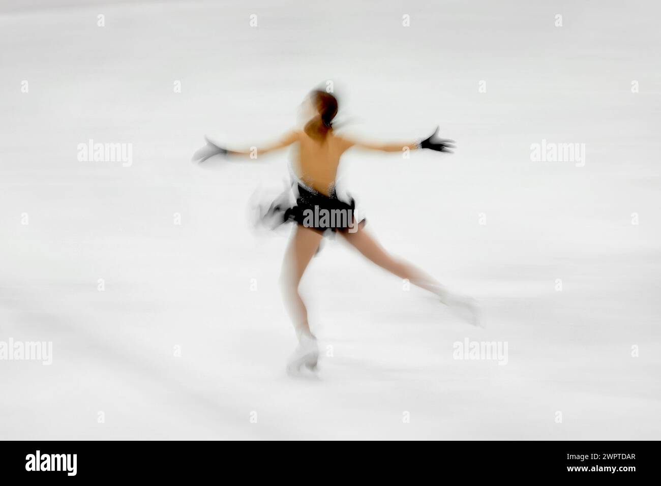 patineur artistique sur un fond blanc Banque D'Images