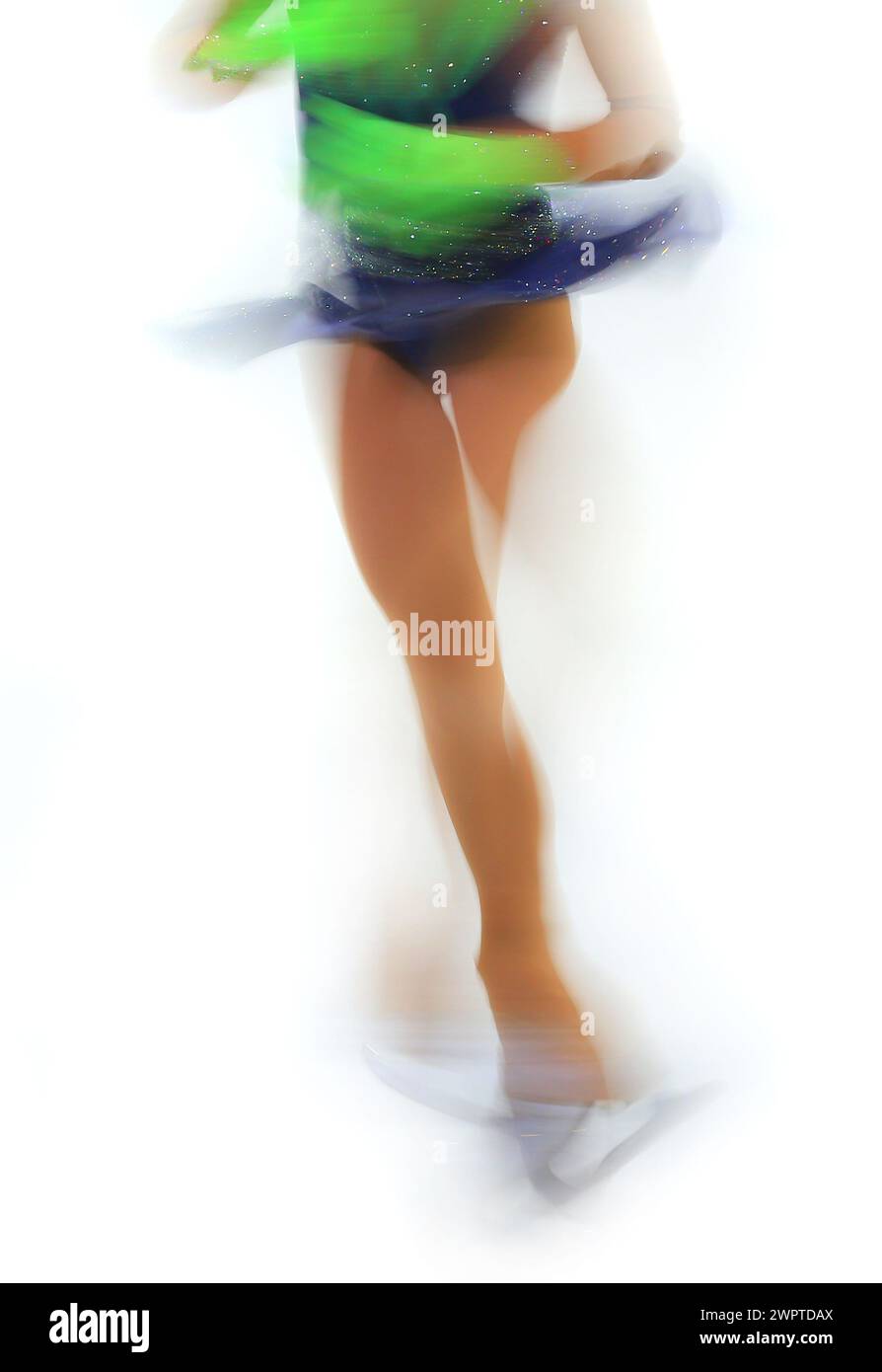 patineur artistique sur un fond blanc Banque D'Images
