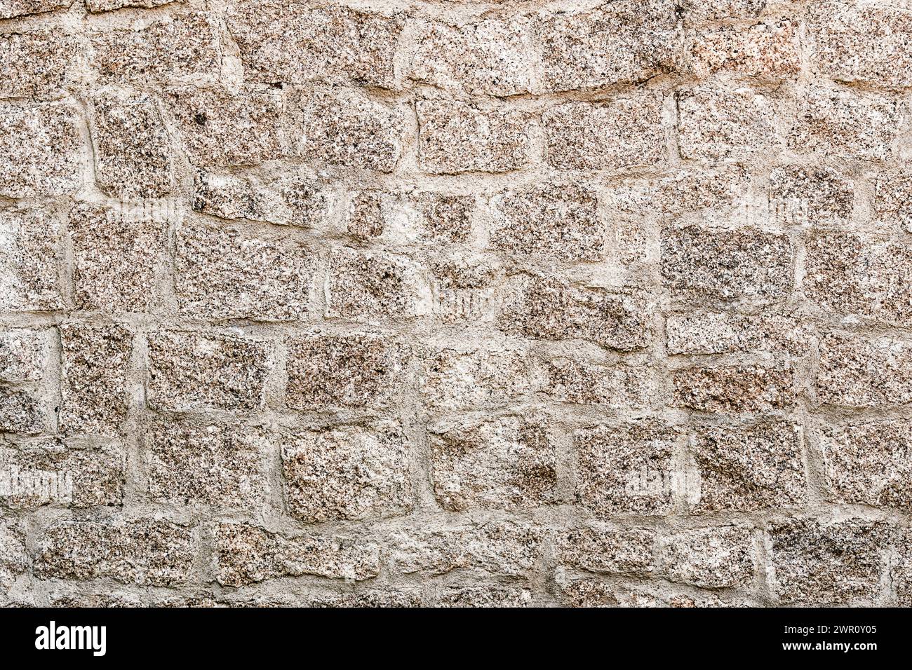 Fond de mur de pierre. Vue rapprochée de face de la texture du mur gris clair Banque D'Images