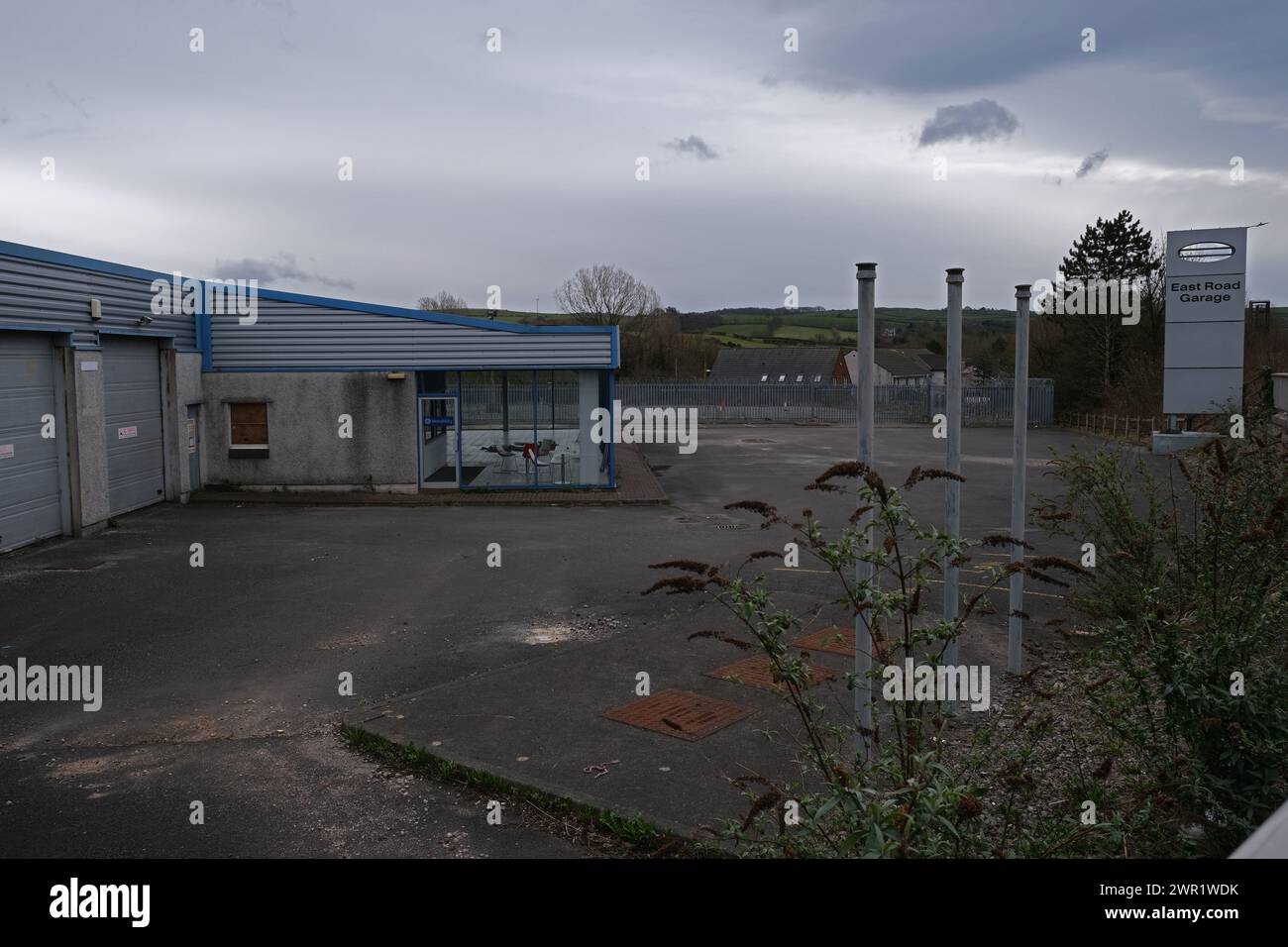 garage de la route est egremont cumbria site proposé pour le nouveau supermagasin aldi Banque D'Images