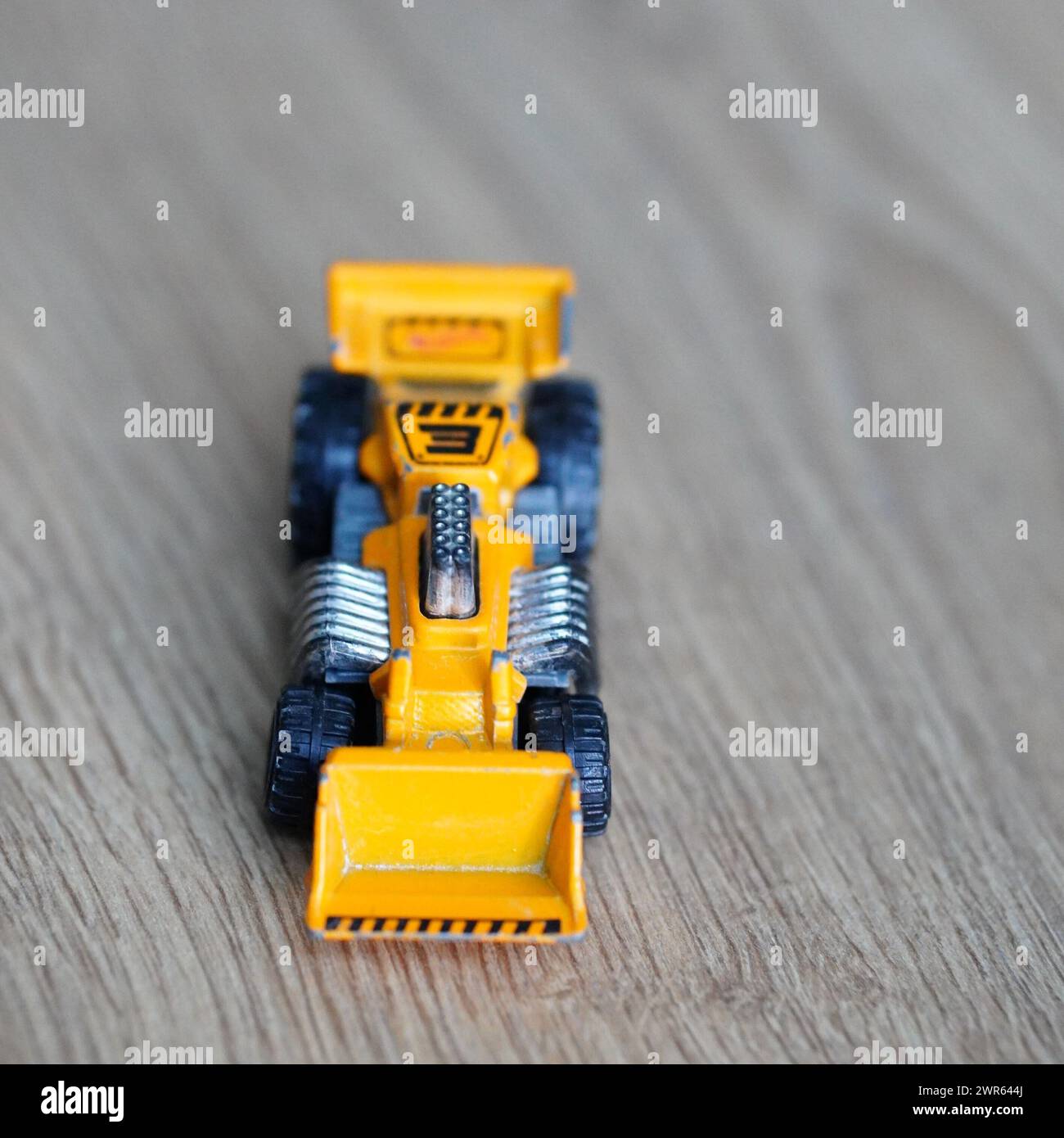 Gros plan d'un véhicule de construction miniature Banque D'Images