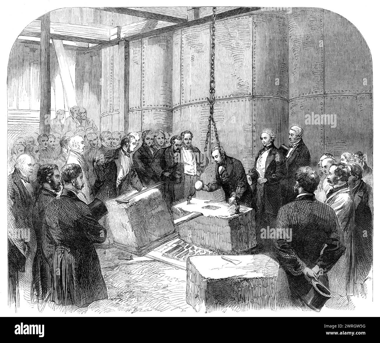 Pose de la pierre de fondation du quai de la Tamise à Whitehall Stairs, 1864. M. John Thwaites, président du Metropolitan Board of Works, a rempli les fonctions. Le quai de la Tamise est une œuvre de génie civil du XIXe siècle qui a récupéré des terres à côté de la Tamise dans le centre de Londres. Il se compose du Victoria Embankment et du Chelsea Embankment. Tiré de "Illustrated London News", 1864. Banque D'Images