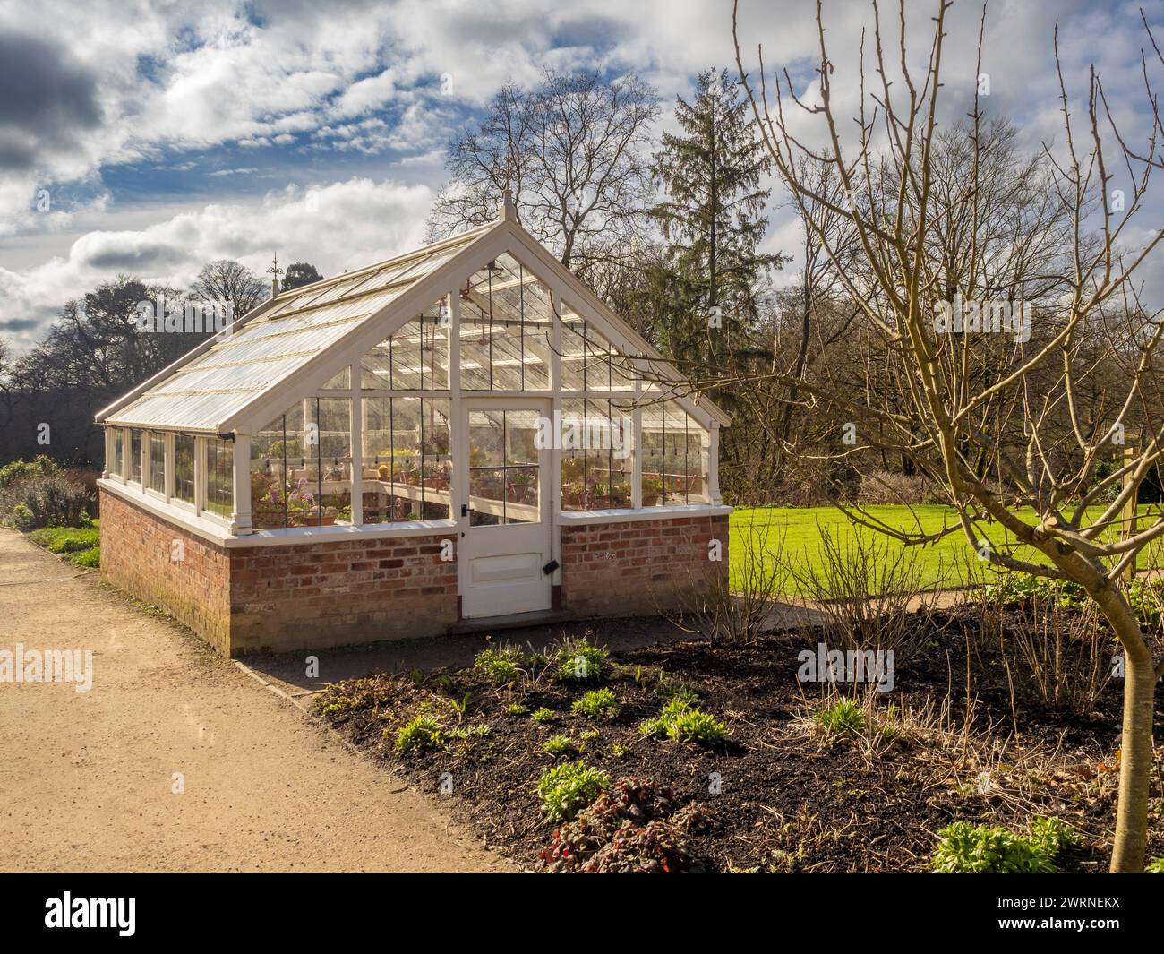 Serre traditionnelle dans le jardin clos de Quarry Bank. Banque D'Images