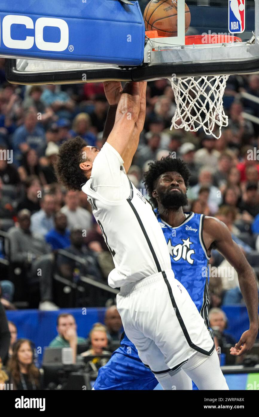 Orlando, Floride, États-Unis, 13 mars 2024, L'attaquant de Brookyn nets Cam Johnson #2 tente de faire un dunk au Kia Center. (Crédit photo : Marty Jean-Louis/Alamy Live News Banque D'Images