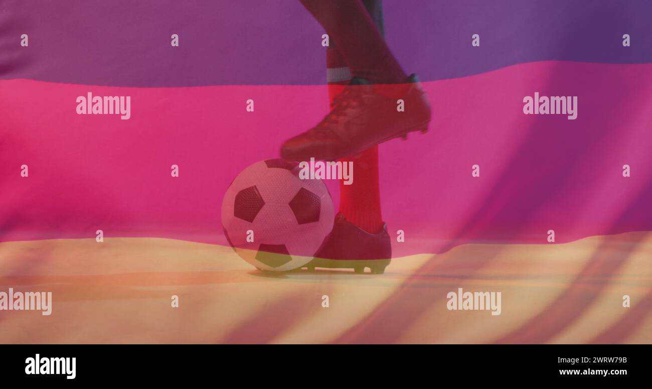 Image d'un joueur de football afro-américain au-dessus du drapeau de l'allemagne Banque D'Images