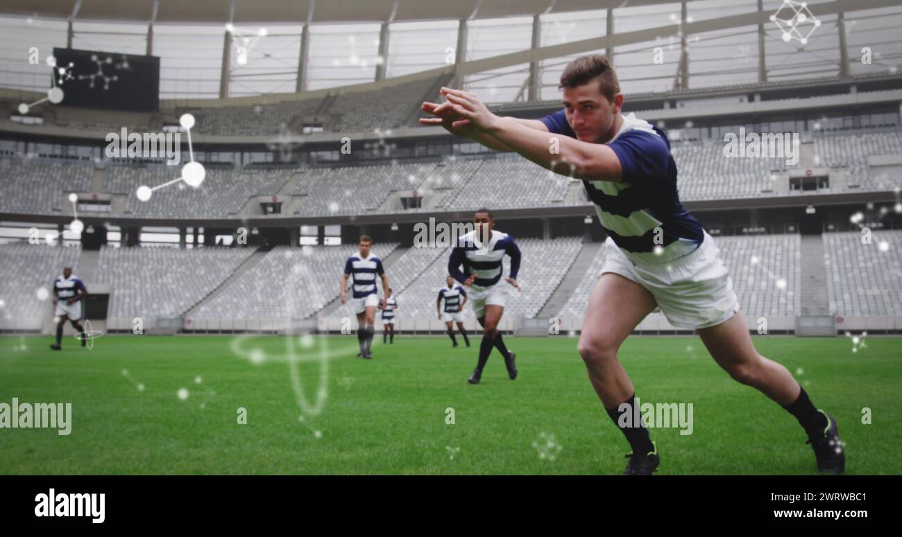 Image de structures chimiques sur des joueurs de rugby masculins au stade Banque D'Images