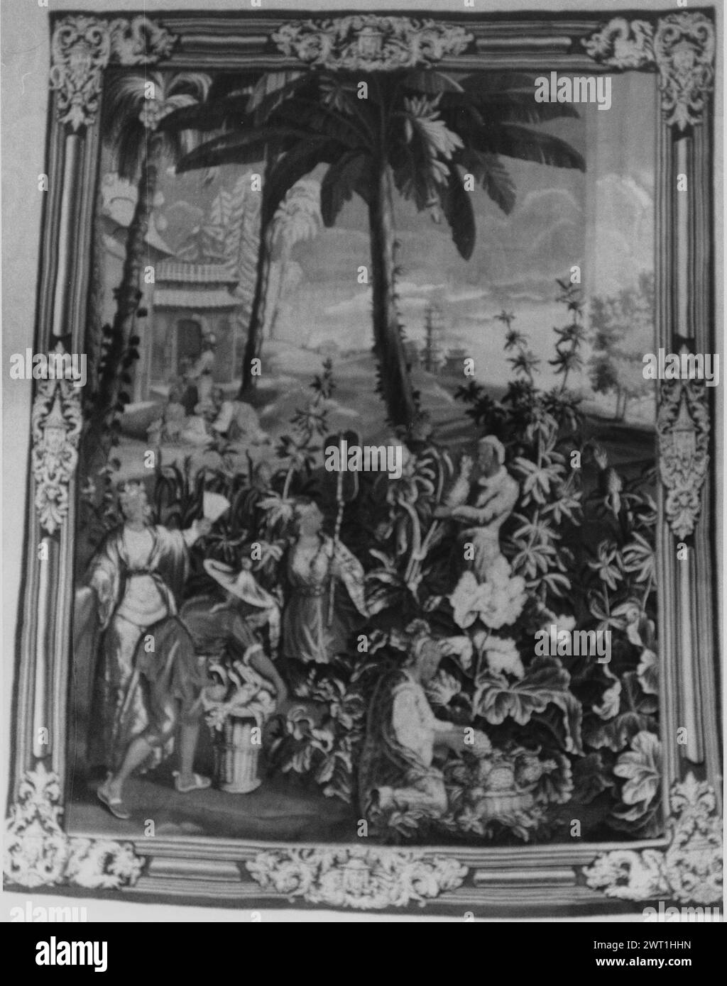 Récolte d'ananas. Vernansal, Guy-Louis (français, 1648-1729) (auteur de design, attr.) Monnoyer, Jean-Baptiste (français, 1636-1699) (auteur du dessin) [peintre] Belin, Jean-Baptiste I (français, 1653-1715) (auteur du dessin) [peintre] c. 1700 tapisserie matériaux/techniques : culture inconnue : Centre de tissage français : Beauvais histoire de la propriété : Allemagne, Bavière, Munich, Schloss Nymphenburg. Dans le paysage avec champ d'ananas, de palmiers et de pins, femme sur l (=Empress?), gestes avec ventilateur pendant que 2 ouvriers rassemblent des ananas dans des paniers en osier au premier plan ; l'homme cueille l'ananas comme femme de ménage kne Banque D'Images