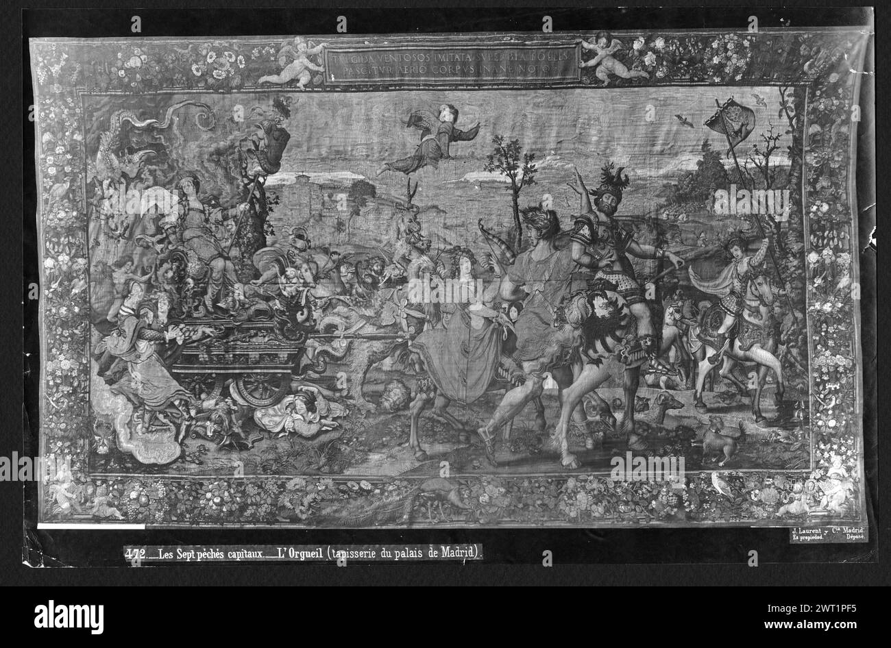 Fierté. Coecke van Aelst, Pieter (le jeune) (pays-Bas (avant 1600) - Flandre, bef.1527-CA.1559) (auteur du dessin) [peintre] Pannemaker, Wilhelm de (pays-Bas (avant 1600) - Flandre, acte. 1535-1578) (atelier) [tisserand] c. 1550 tapisserie dimensions : H 4,47 x l 7,48 m tapisserie matériaux/techniques : laine et soie (trame) ; fil métallique (or, trame) ; fil métallique (argent, trame) culture : Centre de tissage flamand : Bruxelles histoire de propriété : Marie de Hongrie coll. Philippe II coll., Madrid. Espagne, Madrid, Palacio Real de Madrid, accno. A. 257-7428. Inscriptions : inscription en borde supérieure Banque D'Images