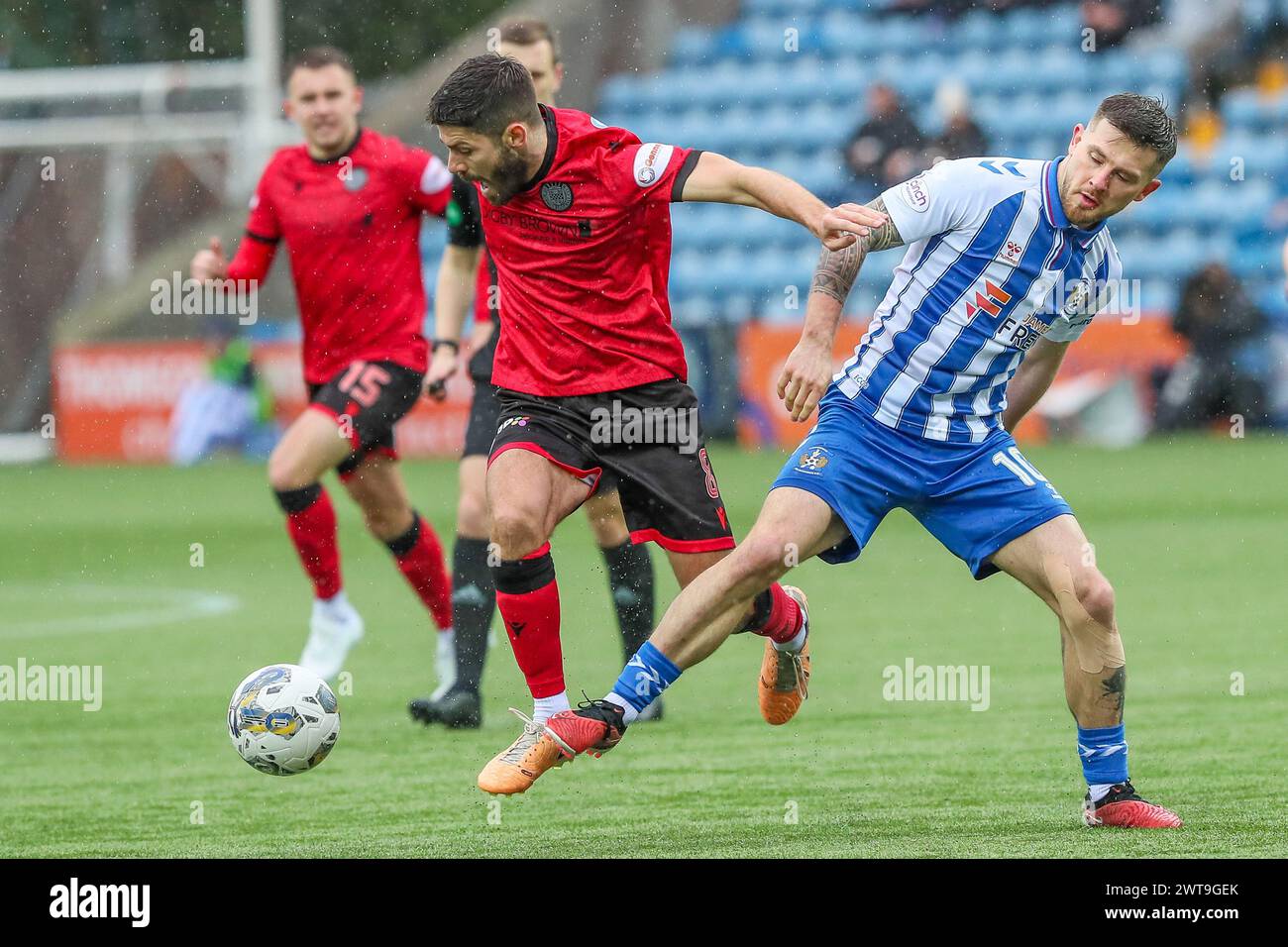 Kilmarnock, Royaume-Uni. 16 mars 2024. Kilmarnock FC a joué contre St Mirren FC au Rugby Park, Kilmarnock, Ayrshire, Écosse, Royaume-Uni lors d'un important match de premier rang écossais. Le score final était Kilmarnock 5 - 2 St Mirren. Les buteurs de Kilmarnock étaient Kyle Vassell (Kilmarnock 9) 61 min et 73 min, Daniel Armstrong (Kilmarnock 11) 65 min, penalty, Marley Watkins (Kilmarnock 23) 68 min et Daniel Watson (Kilmarnock 12) 79 min. Les buteurs de St Mirren étaient Charles Dunne (St Mirren 18) 20 minutes et Mikael Mandron (St Mirren 9) 39 minutes. Crédit : Findlay/Alamy Live News Banque D'Images