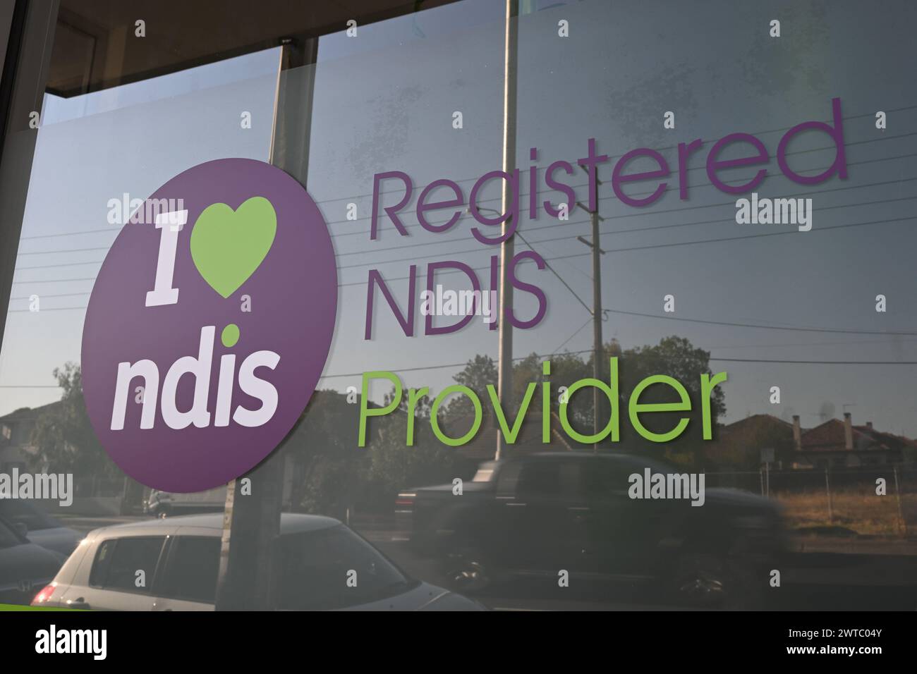 J'ai le cœur signe NDIS dans la fenêtre d'un fournisseur enregistré d'assurance invalidité nationale Banque D'Images