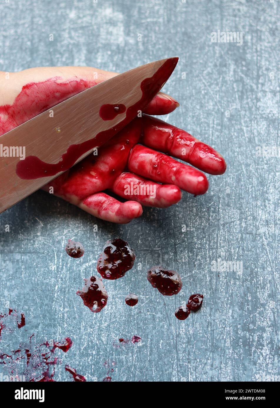Main sanglante gros plan photo. Suicide, abus, meurtre, concept de crime. Banque D'Images