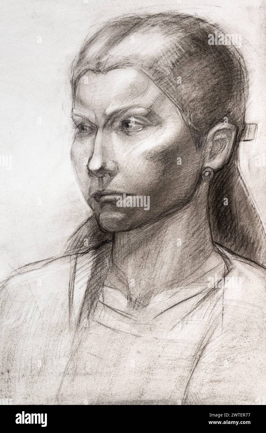 Étudiez le portrait d'une fille avec les cheveux séparés charbon de bois dessiné à la main sur papier blanc Banque D'Images