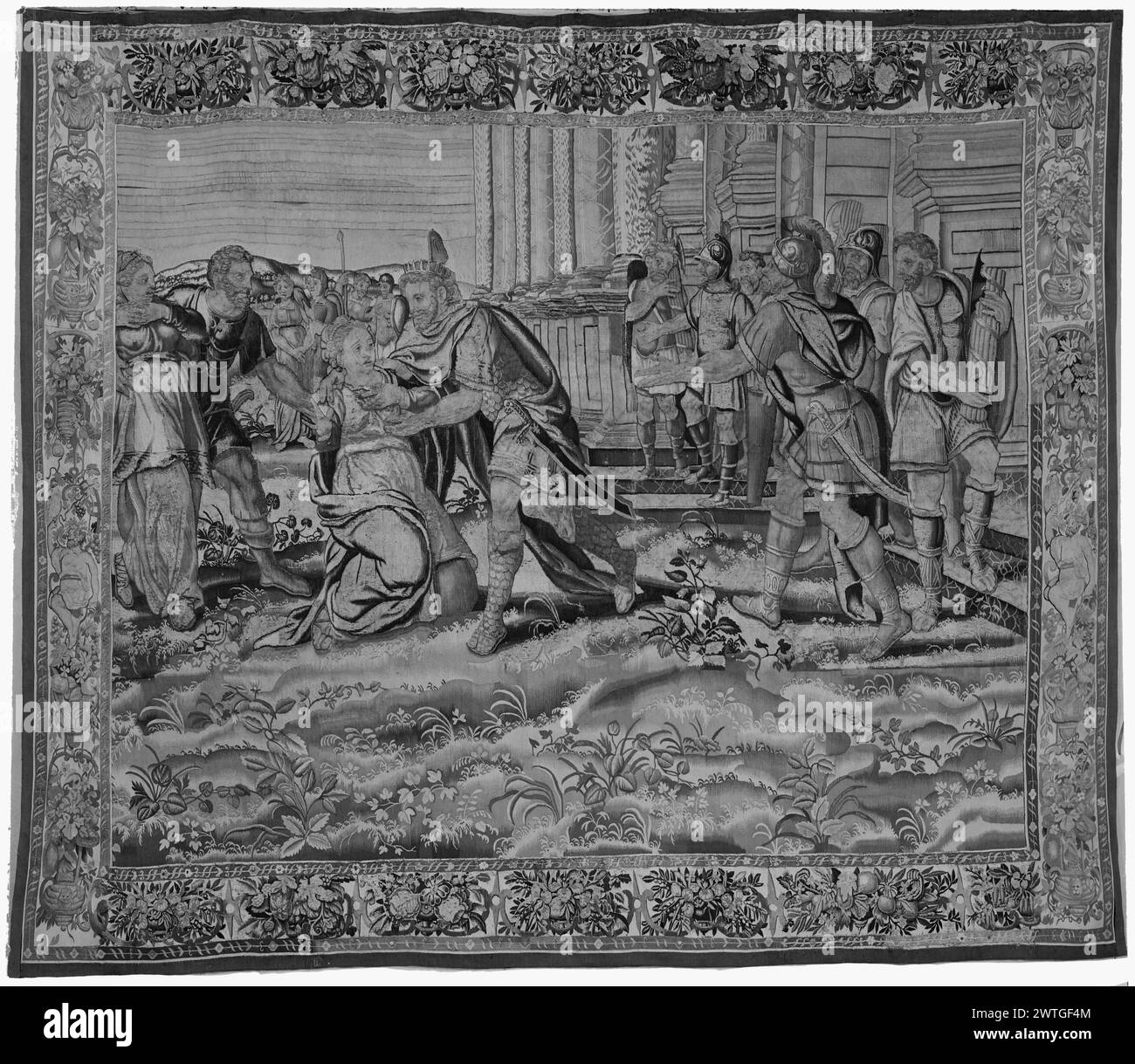 Captive Sophonisba (Sophonisbe) s'agenouille devant le roi Masinissa, qui est charmé par sa beauté. Inconnu c. 1550-1575 dimensions de tapisserie : H 8'3' x l 10'1' matériaux/techniques de tapisserie : inconnu culture : Centre de tissage flamand : inconnu historique de propriété : Français et Co. acheté au Denver Art Museum, reçu le 12/22/1956 (crédit 7009 5/23/1961) ; vendu à Transglobe Mercantile Export Co. 2/6/1962. Femme s'agenouille devant l'homme portant une couronne dans un cadre paysager à l'extérieur du palais ; soldats sur R (UPR & LWR BRD) bouquets de fruits et fleurs ; (l & R BRD) vases de fleurs ; satyre (?) Feuille de stock française et coréenne en a Banque D'Images