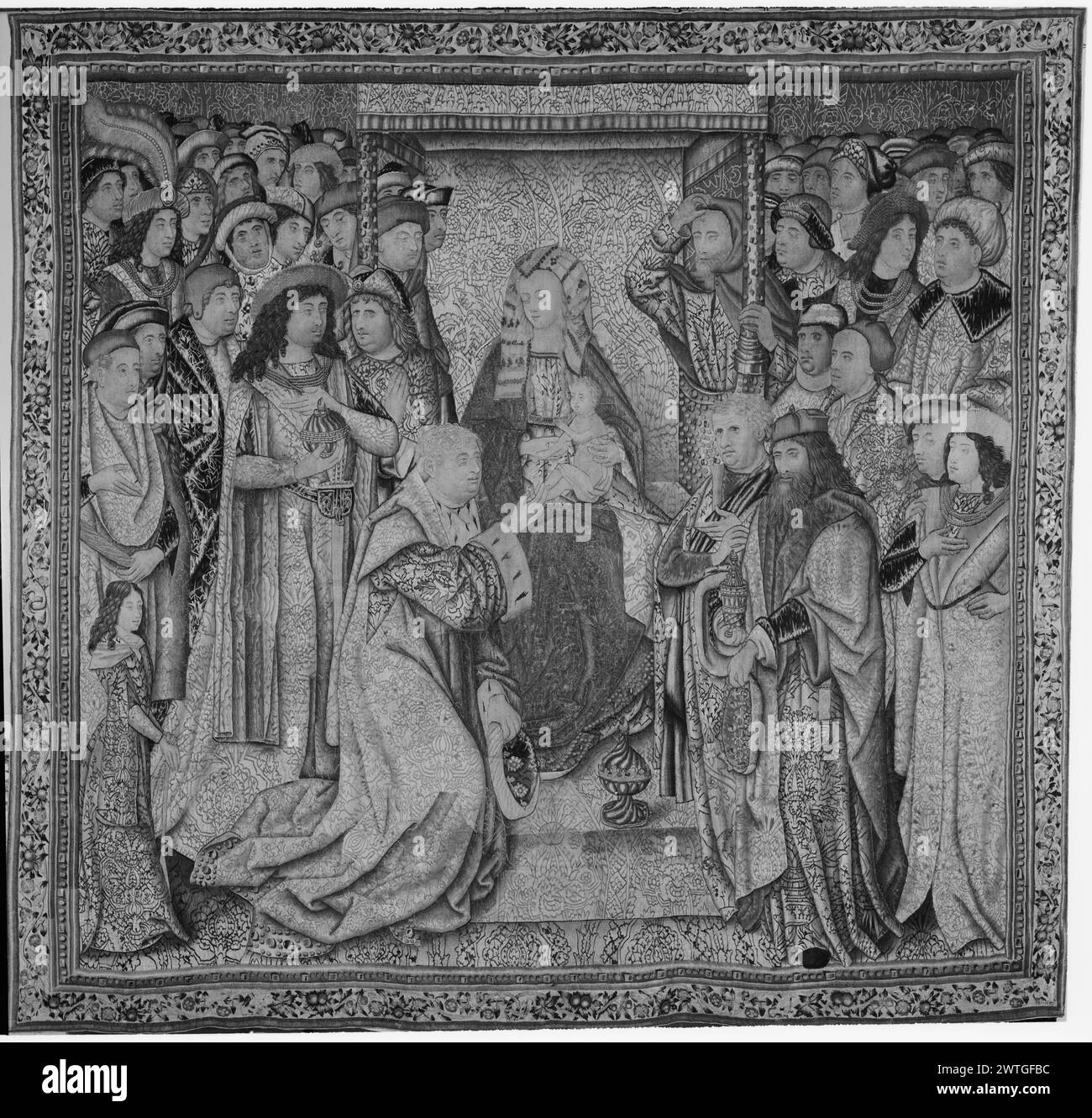 Adoration du Christ-enfant par les Mages (sages/rois). Inconnu c. 1490-1510 tapisserie dimensions : H 9'8' x l 10'4' tapisserie matériaux/techniques : laine (trame) ; soie (trame) ; fil métallique (trame) culture : Sud des pays-Bas Centre de tissage : inconnu histoire de propriété : Paul Dansette coll., Bruxelles. Duveen Brothers, New York. Leon Schinasi coll., New York. French & Co puchased from MRS Leon Shinasi [vente Galeries Parke-Bernet, lot 406, vente Shinasi] 11/1944 ; vendu au Musée National [ville non spécifiée]. 3 Mages présentent leurs dons (or, encens et myrrhe) à Christ-enfant, assis sur la Vierge ma Banque D'Images