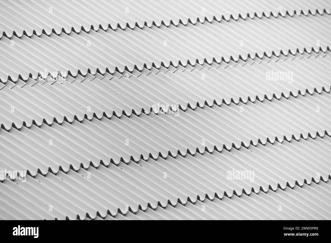 Tuiles de toit en métal blanc, gros plan de photo abstrait Banque D'Images