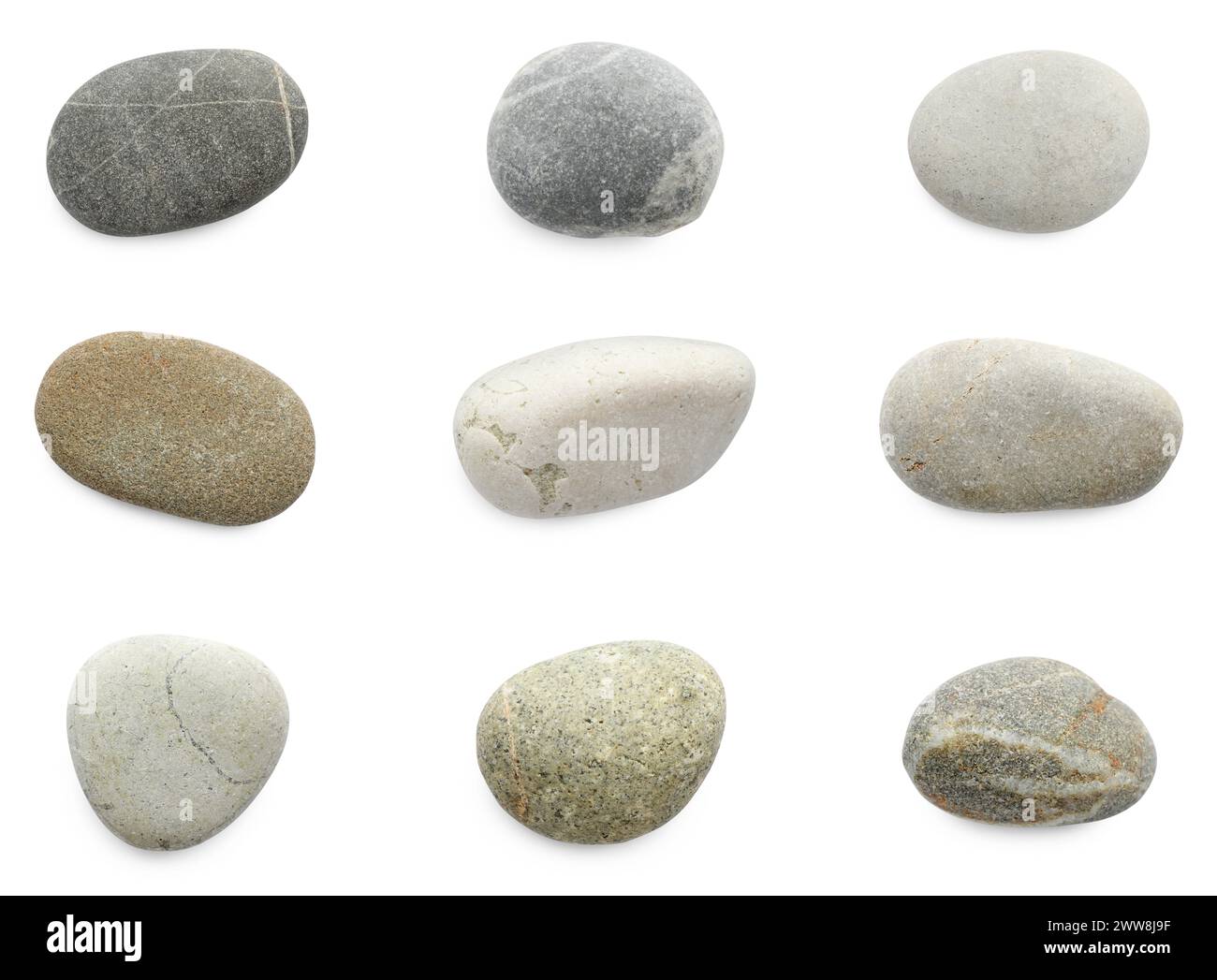 Cailloux de mer. Différentes pierres isolées sur blanc, serties Banque D'Images