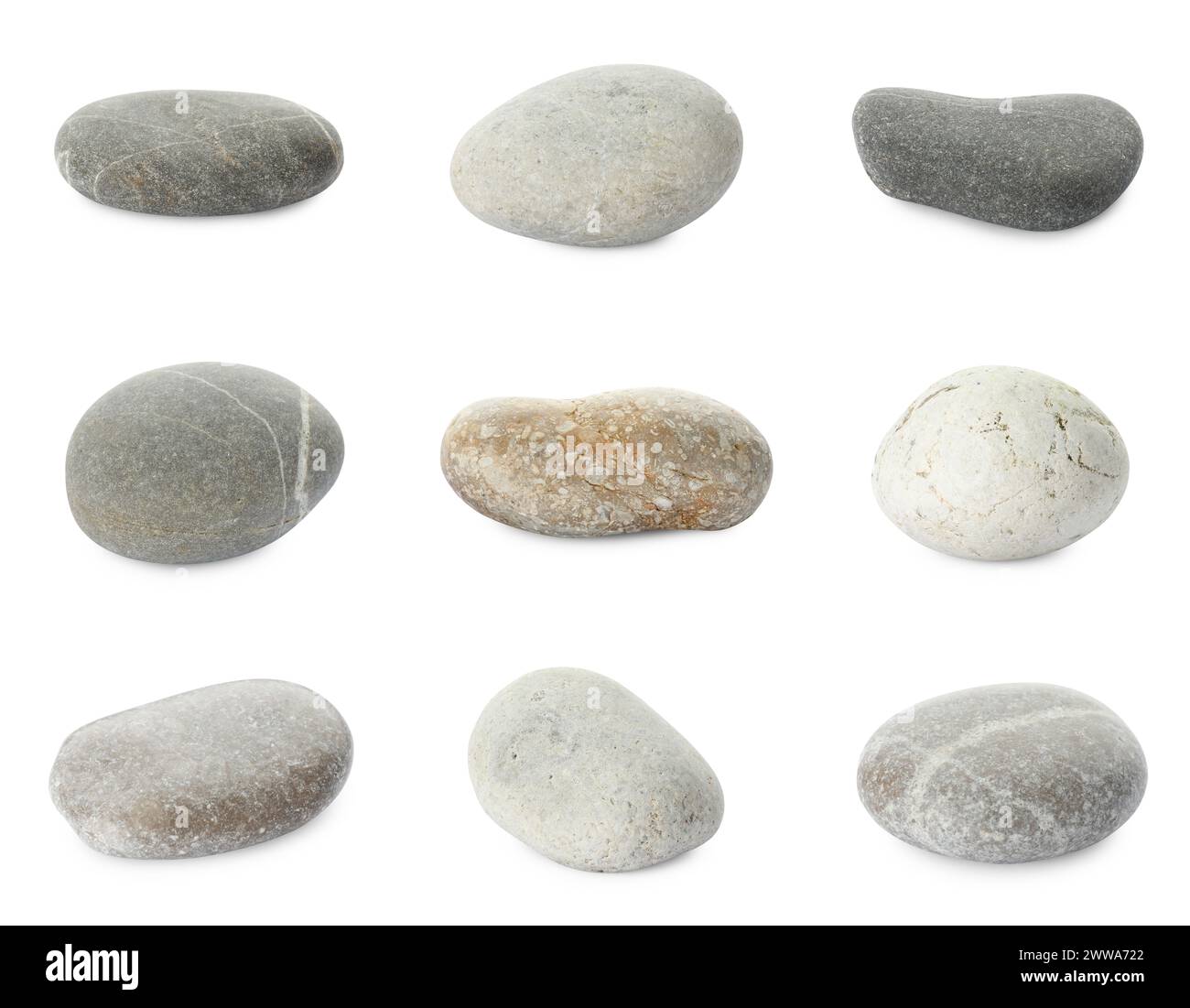 Cailloux de mer. Différentes pierres isolées sur blanc, serties Banque D'Images