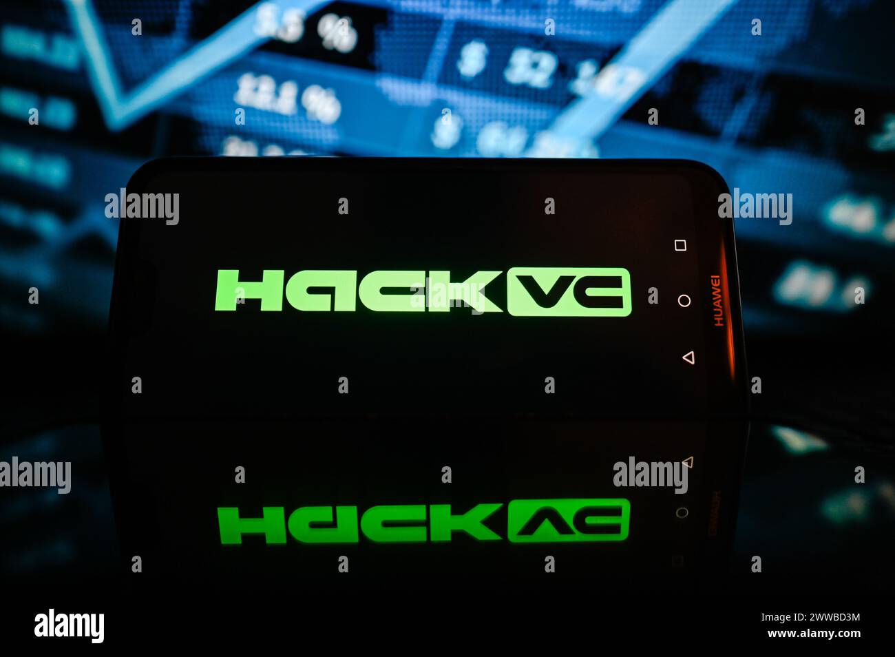 Pologne. 23 mars 2024. Dans cette illustration photo, un logo Hack VC est affiché sur un smartphone avec des pourcentages boursiers en arrière-plan. Crédit : SOPA images Limited/Alamy Live News Banque D'Images Pologne. 23 mars 2024. Dans cette illustration photo, un logo Hack VC est affiché sur un smartphone avec des pourcentages boursiers en arrière-plan. Crédit : SOPA images Limited/Alamy Live News Banque D'Images