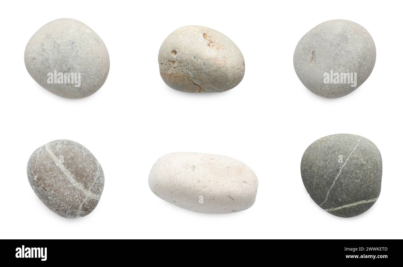 Cailloux de mer. Différentes pierres isolées sur blanc, serties Banque D'Images
