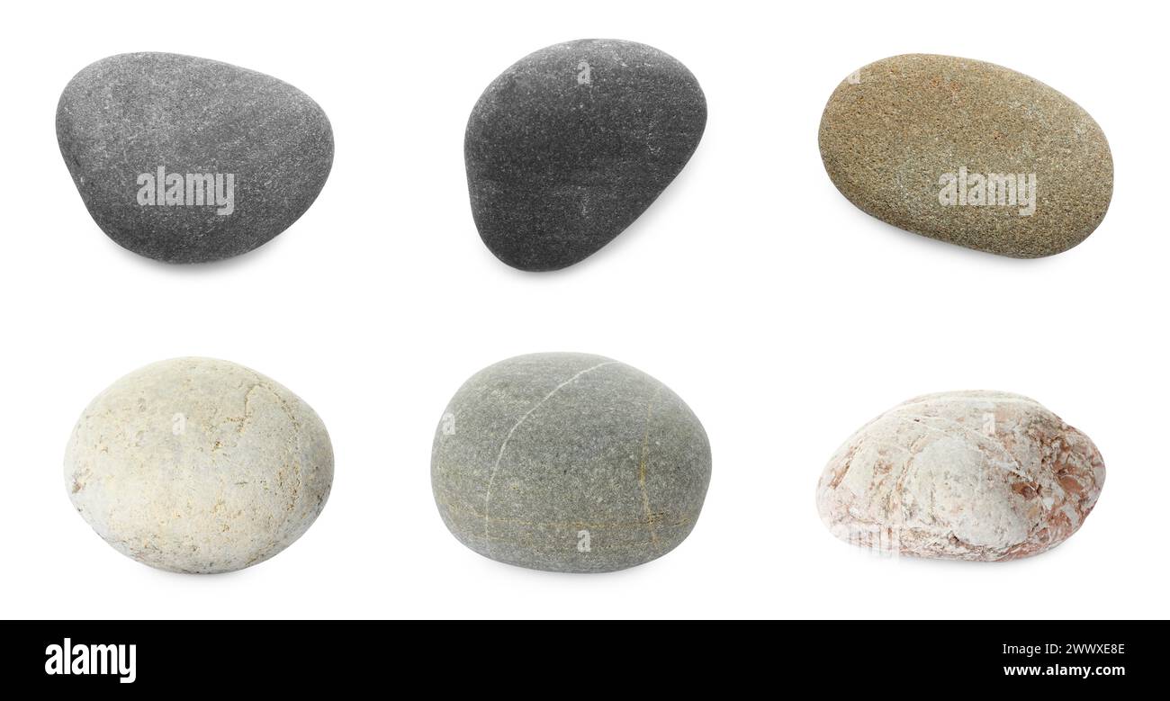 Cailloux de mer. Différentes pierres isolées sur blanc, serties Banque D'Images