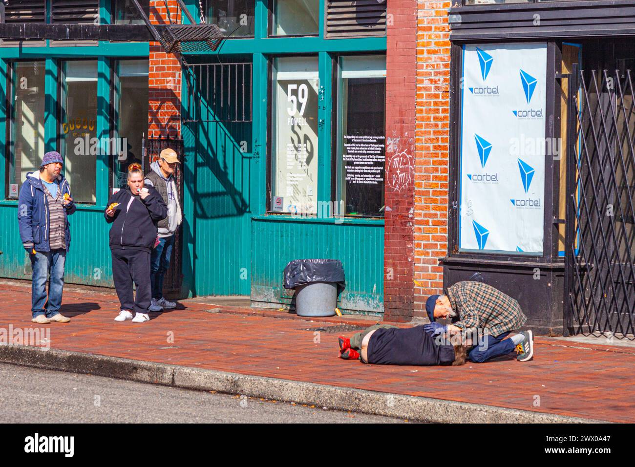 Une victime d'overdose de drogue dans le district de Gastown à Vancouver Canada Banque D'Images