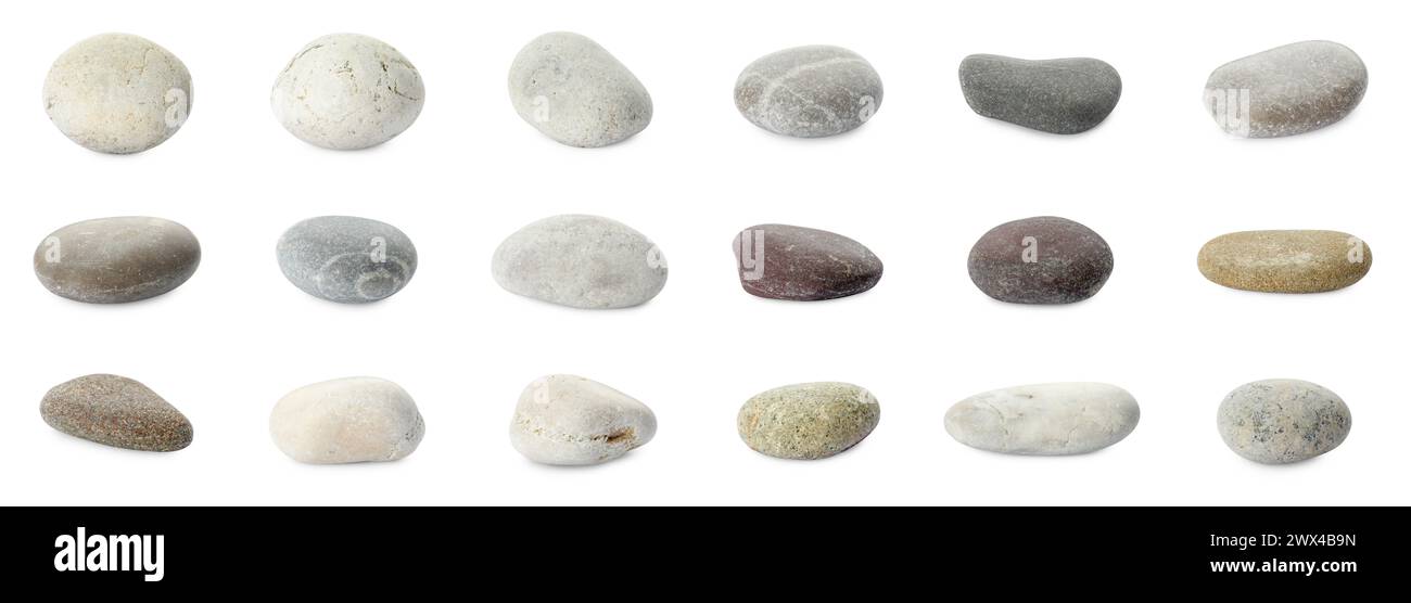 Cailloux de mer. Différentes pierres isolées sur blanc, serties Banque D'Images