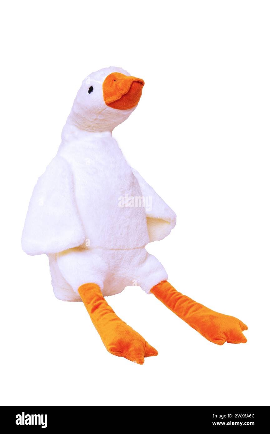 Canard en peluche isolé. Animaux en peluche jouet pour enfants. Jouet en peluche blanc doux ente pour les enfants isolé sur un fond blanc. Entrez dans le jouet en peluche. Canard blanc Banque D'Images