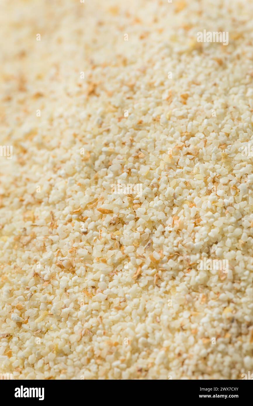 Grain de farine de blé brut biologique dans un bol Banque D'Images