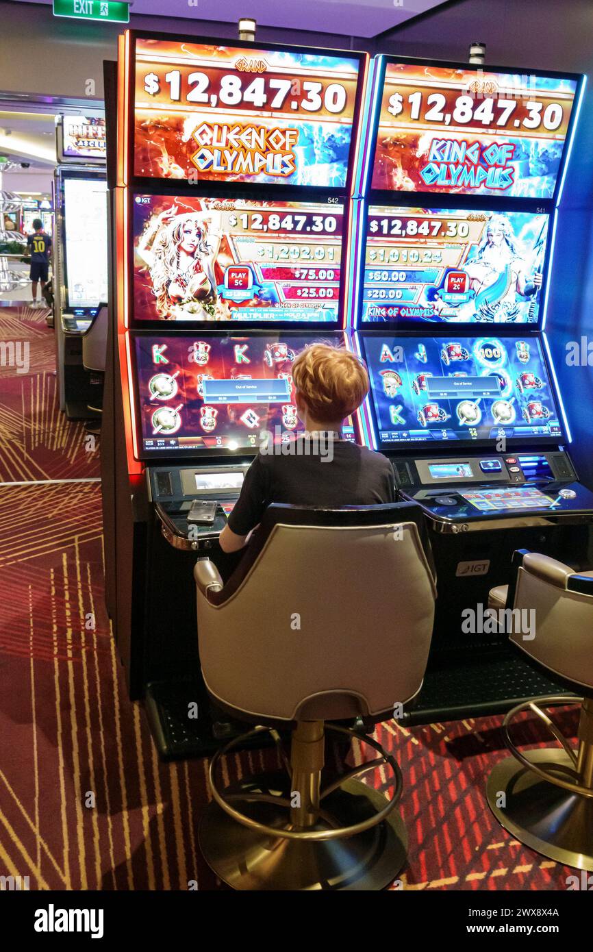 Miami Floride, PortMiami Port de Miami, à bord intérieur, navire Norwegian Joy Cruise Line, 7 jours Caraïbes, machines à sous casino, jeu de mineurs bo Banque D'Images