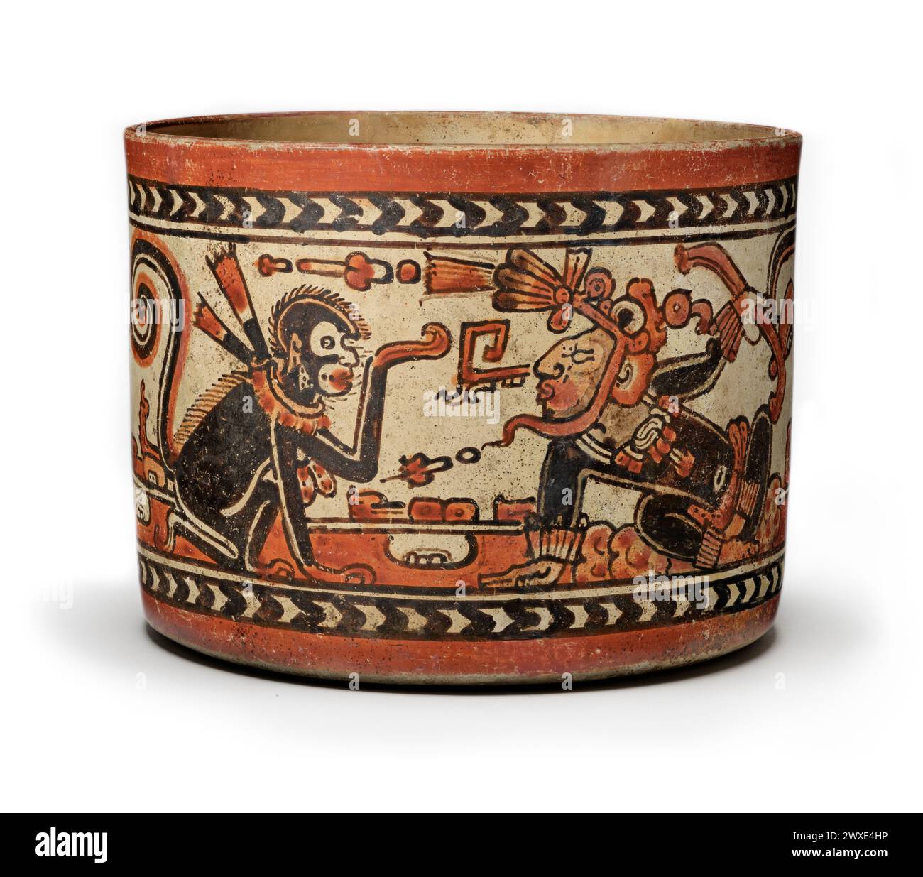Navire polychrome du monde maya - Mexique / Guatemala. Représentant le jeune Seigneur et le singe. Maya, 600-800 ce céramique peinte par glissement. 14,6 cm de haut. Les récipients en céramique élégamment peints constituaient la première forme d'expression artistique au cours de la période classique tardive (550-850 AD) de l'ancienne civilisation maya, et aucun n'était plus magnifiquement peint que ceux connus sous le nom de style codex. Banque D'Images