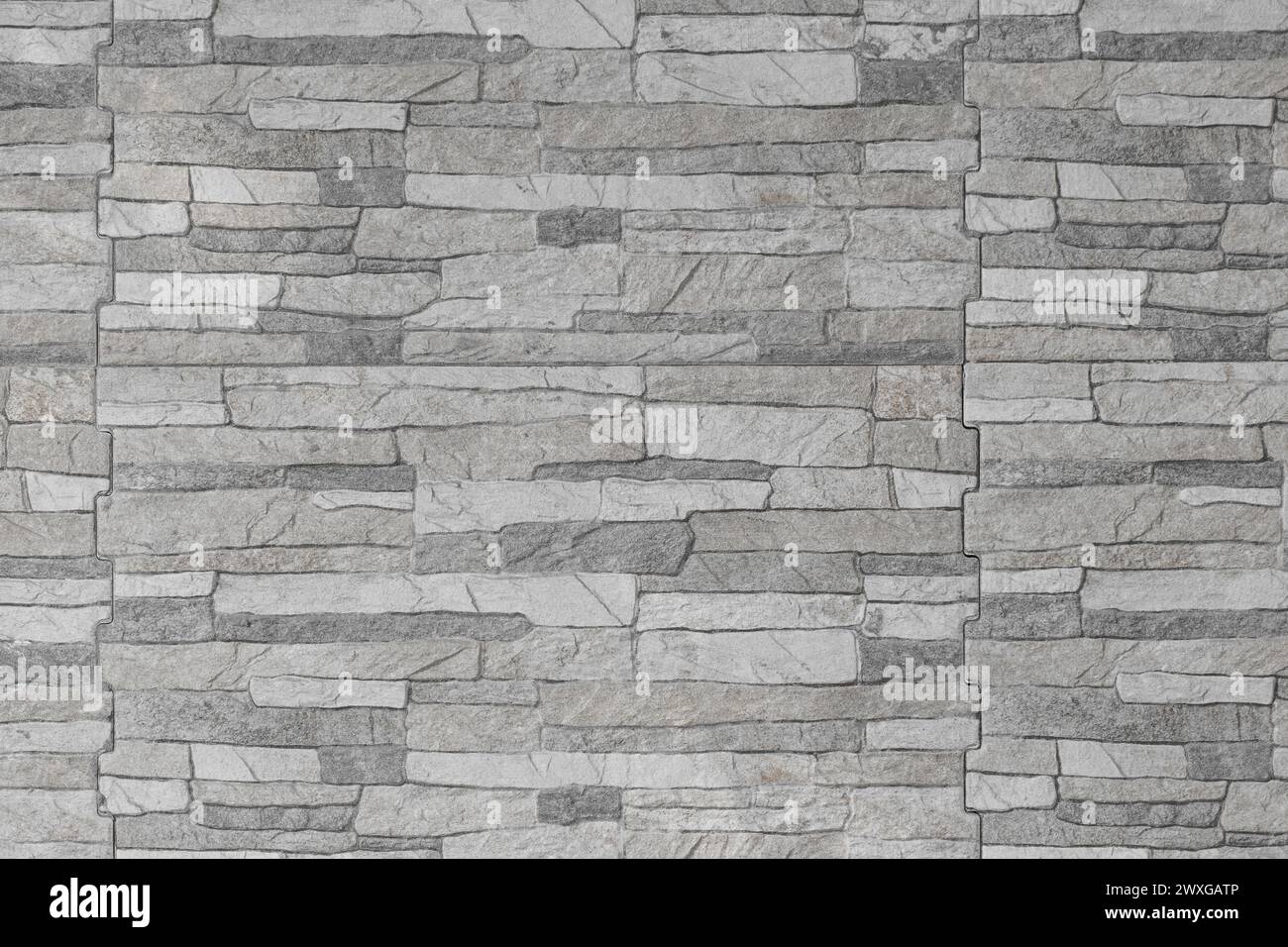 Texture du mur horizontal Pierre gris clair tuile motif abstrait fond gris. Banque D'Images