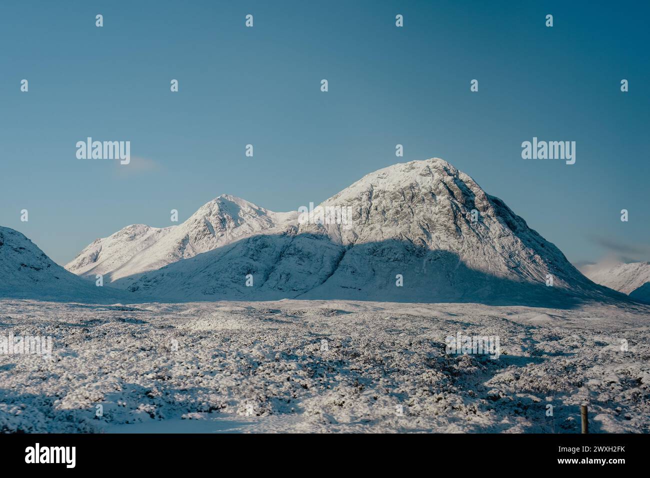Enneigée de Buachaille Etive Mor, une montagne emblématique des hauts plateaux écossais Banque D'Images