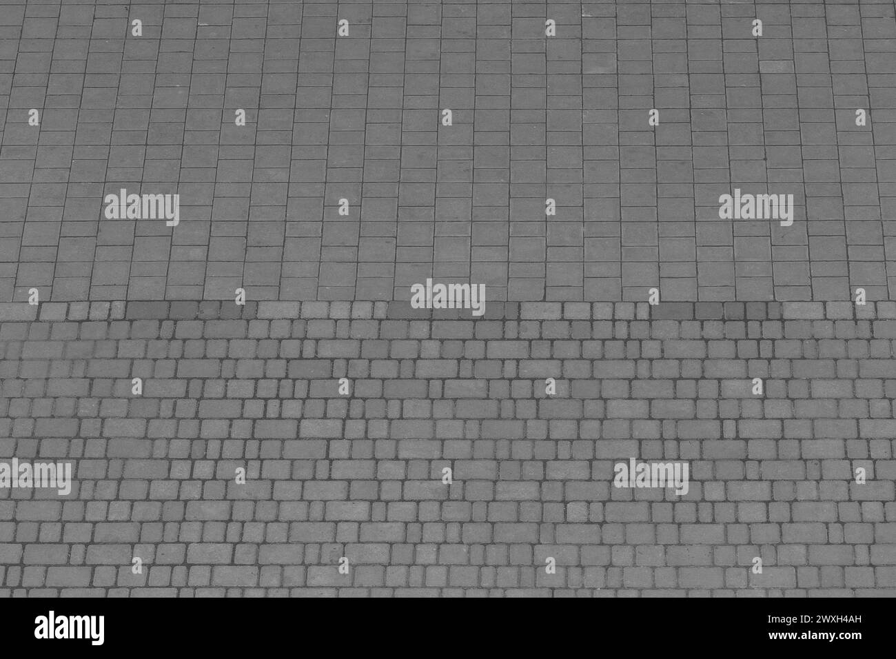 Carrelage gris texture en pierre surface rue ville fond de route motif gris abstrait. Banque D'Images