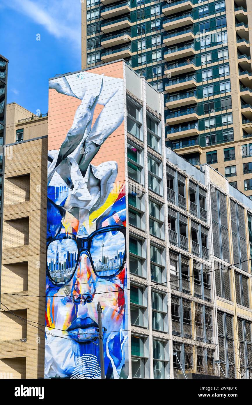 Art urbain peinture graffiti sur le mur latéral d'un immeuble d'habitation, Toronto, Canada Banque D'Images