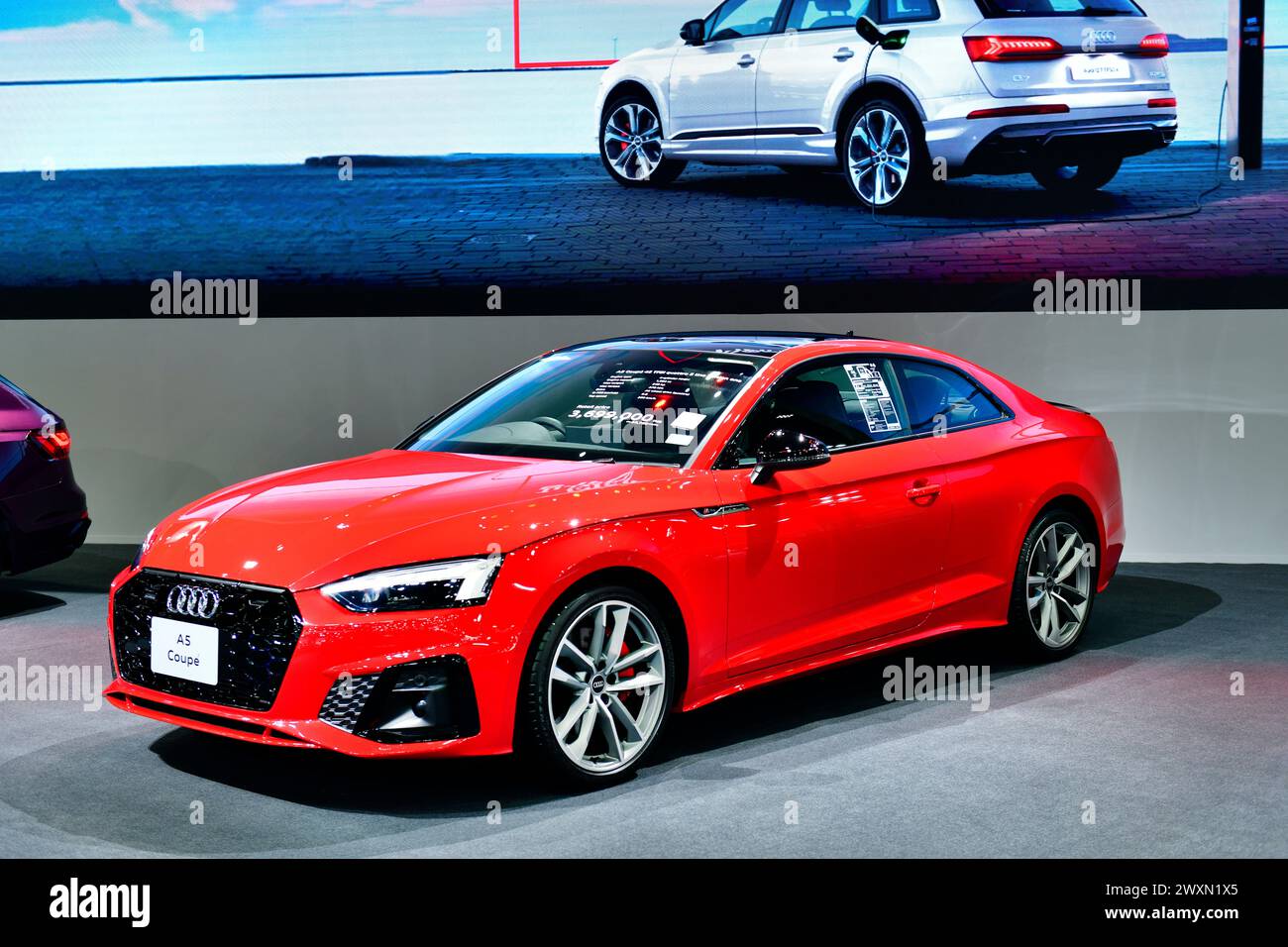 Thaïlande-27 mars 2024 : Red Audi A5 Coupe au salon international de l'automobile de Bangkok 45 à Nonthaburi Banque D'Images