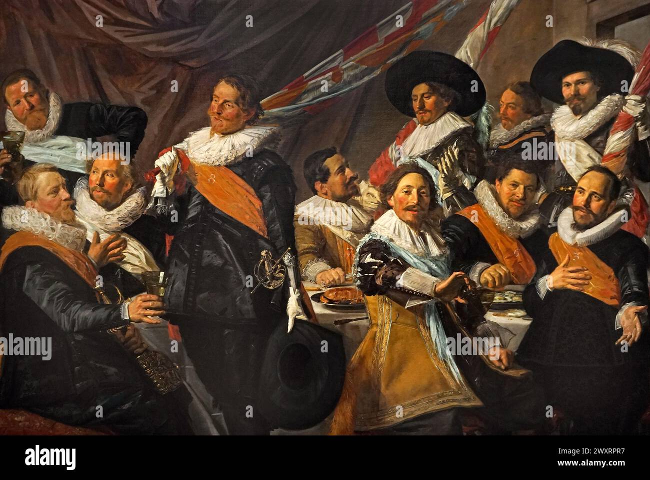 Banquet des officiers de la garde civique de Saint George (c.1627) par le peintre néerlandais Frans Hals (c.1582 –1666).peintre néerlandais de l'âge d'or.Haarlem les pays-Bas Banque D'Images