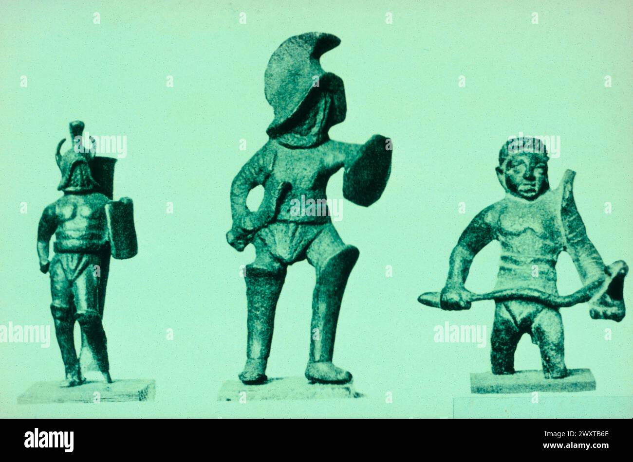 Trois gladiateurs romains anciens, statuettes en bronze Banque D'Images
