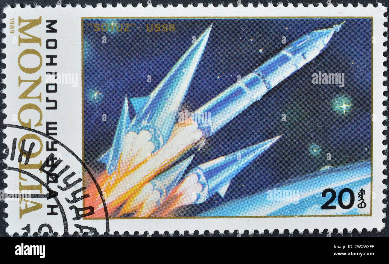 Timbre-poste annulé imprimé par la Mongolie, qui promeut la recherche spatiale. Banque D'Images