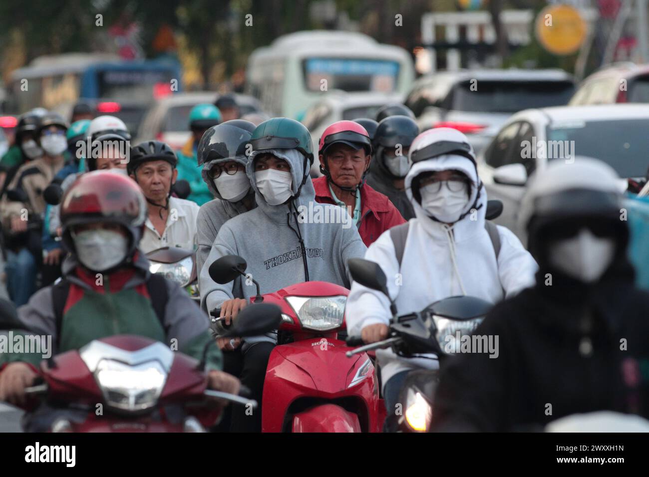 Navetteurs sur scooters, Ho Chi min ville (Saigon), Vietnam Banque D'Images