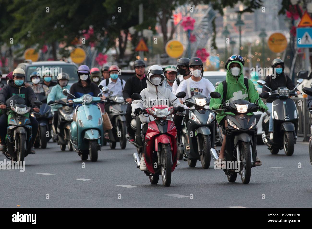 Navetteurs sur scooters, Ho Chi min ville (Saigon), Vietnam Banque D'Images