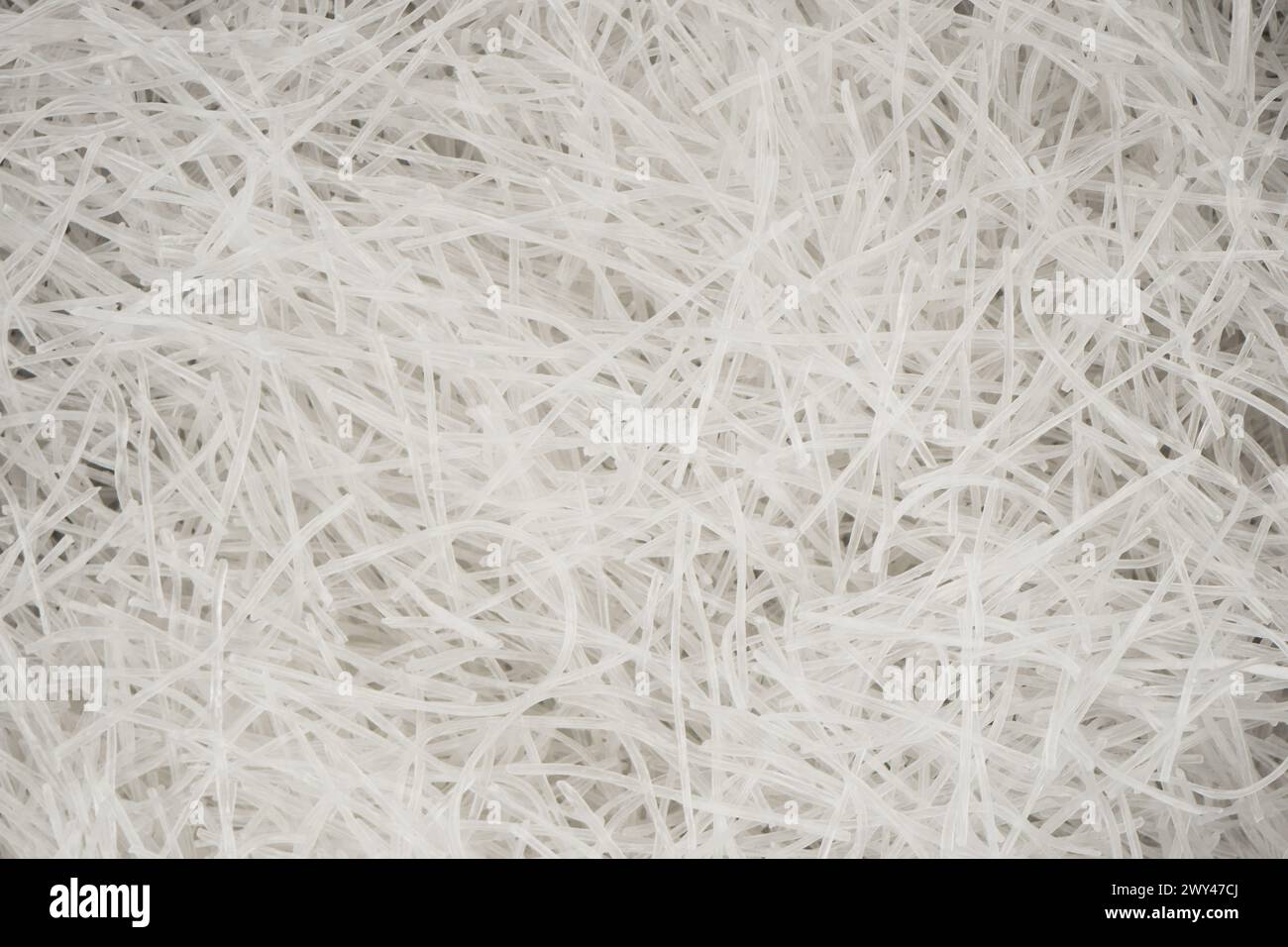 Fond de texture de nouilles de haricot vert. Fonchose brute. Motif funchoza nouilles en verre Banque D'Images
