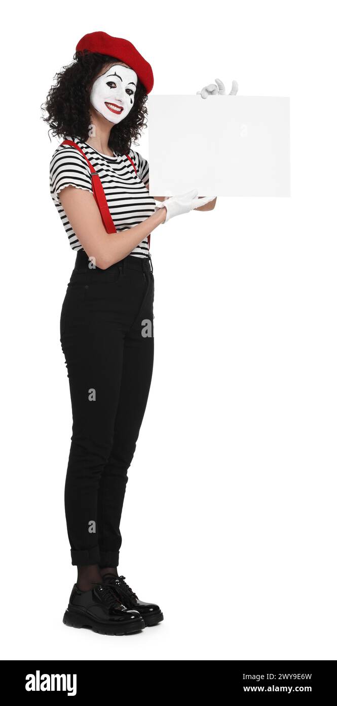 Mime drôle avec signe blanc posant sur fond blanc Banque D'Images