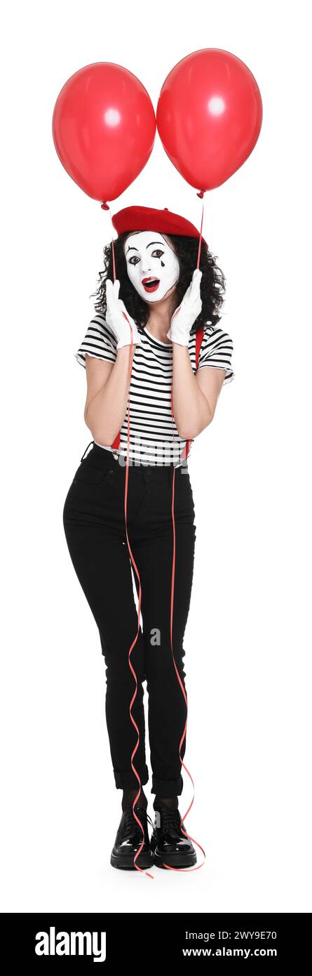 Mime drôle avec des ballons posant sur fond blanc Banque D'Images