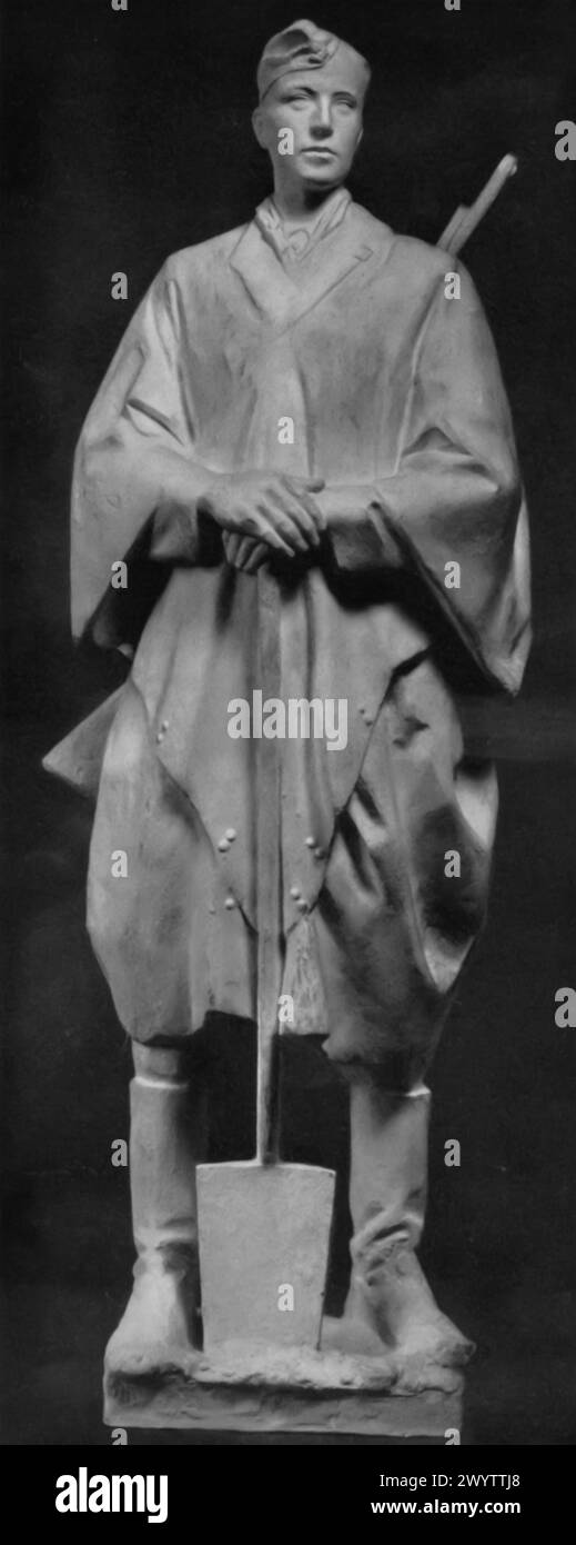 Bad Weather', créé par Fried Heuler en 1942, montre un soldat allemand vêtu d'un manteau tenant une pelle, prêt à travailler malgré les conditions météorologiques difficiles. Cette statue est un morceau de propagande nazie, montrant la ténacité et la volonté du soldat de faire face à des conditions difficiles. Banque D'Images