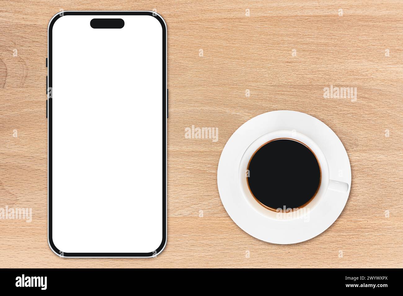 le téléphone est sur la table en bois Banque D'Images