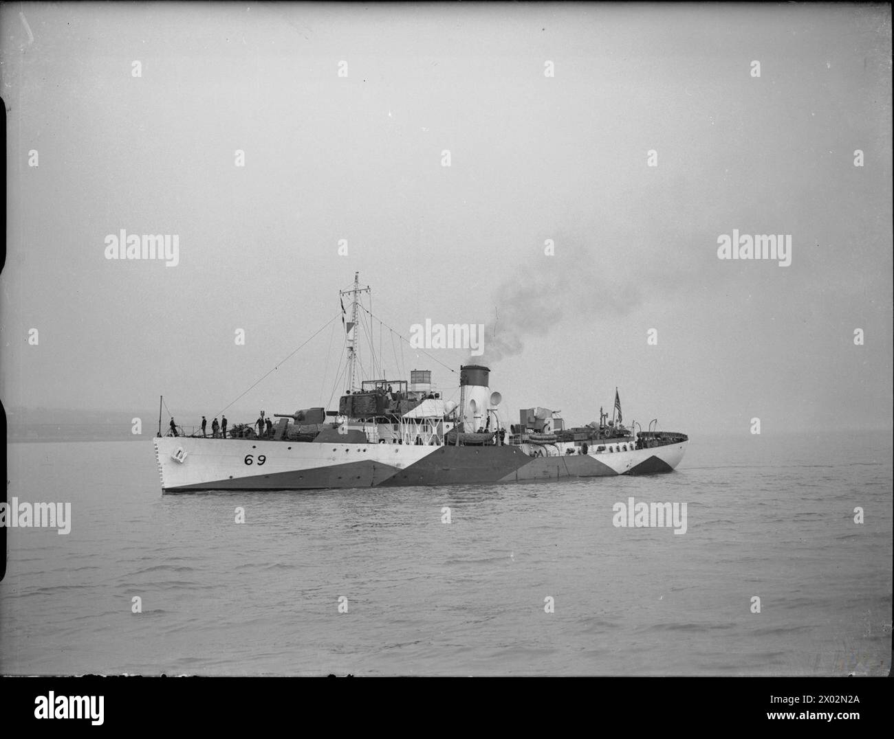 LA ROYAL NAVY PENDANT LA SECONDE GUERRE MONDIALE - USS FURY, anciennement HMS LARKSPUR, dans les eaux côtières au large de Liverpool. Le HMS LARKSPUR fut la première corvette britannique à rejoindre la marine américaine, USS Fury (ex-HMS Larkspur) Banque D'Images