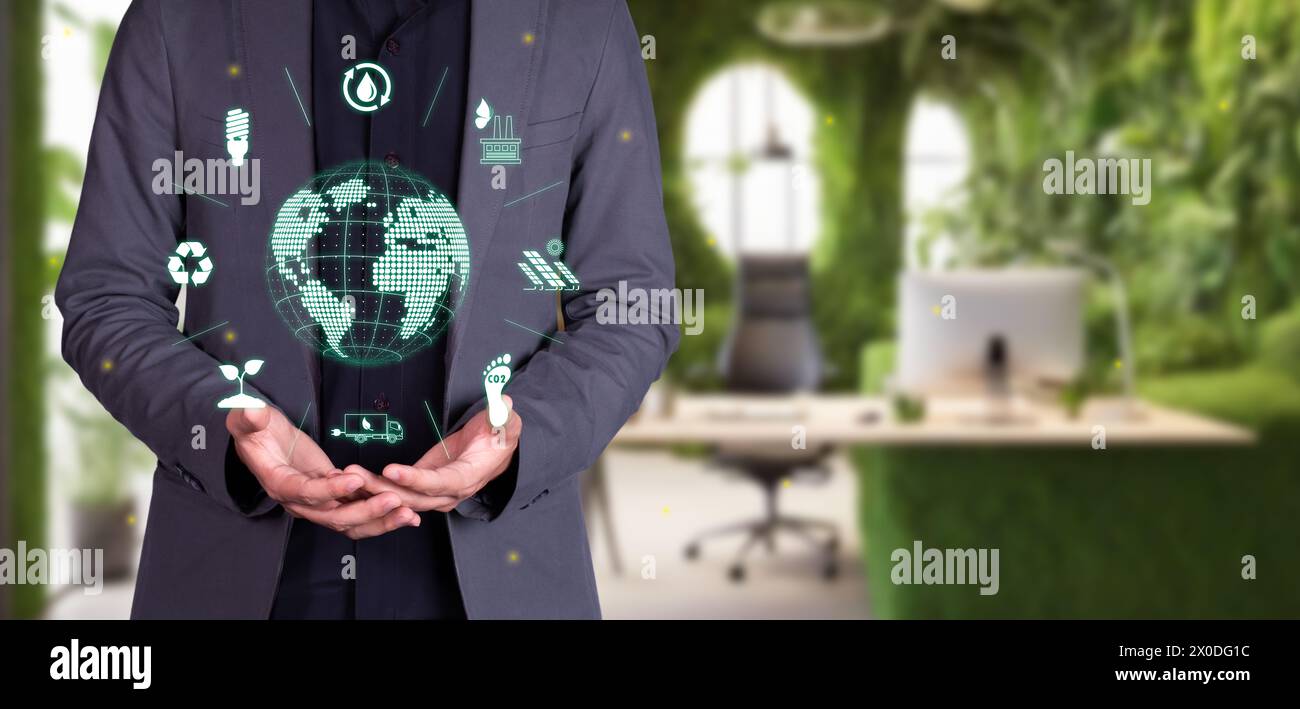 homme d'affaires prend soin de la planète à partir d'une entreprise écologique et verte. concept de responsabilité sociale des entreprises Banque D'Images