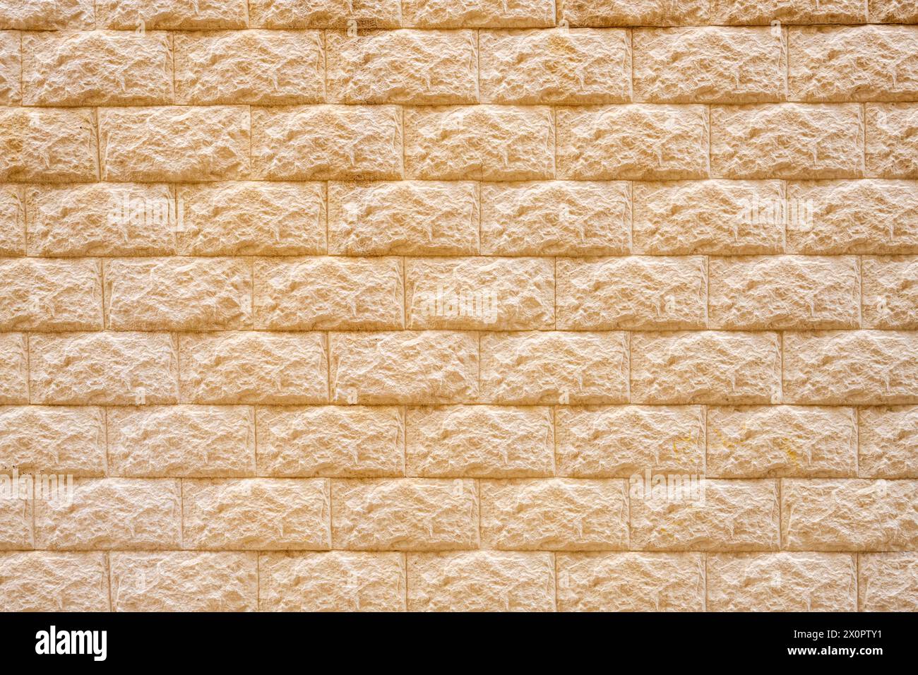 Fond d'un vieux mur de briques beige Banque D'Images Fond d'un vieux mur de briques beige Banque D'Images